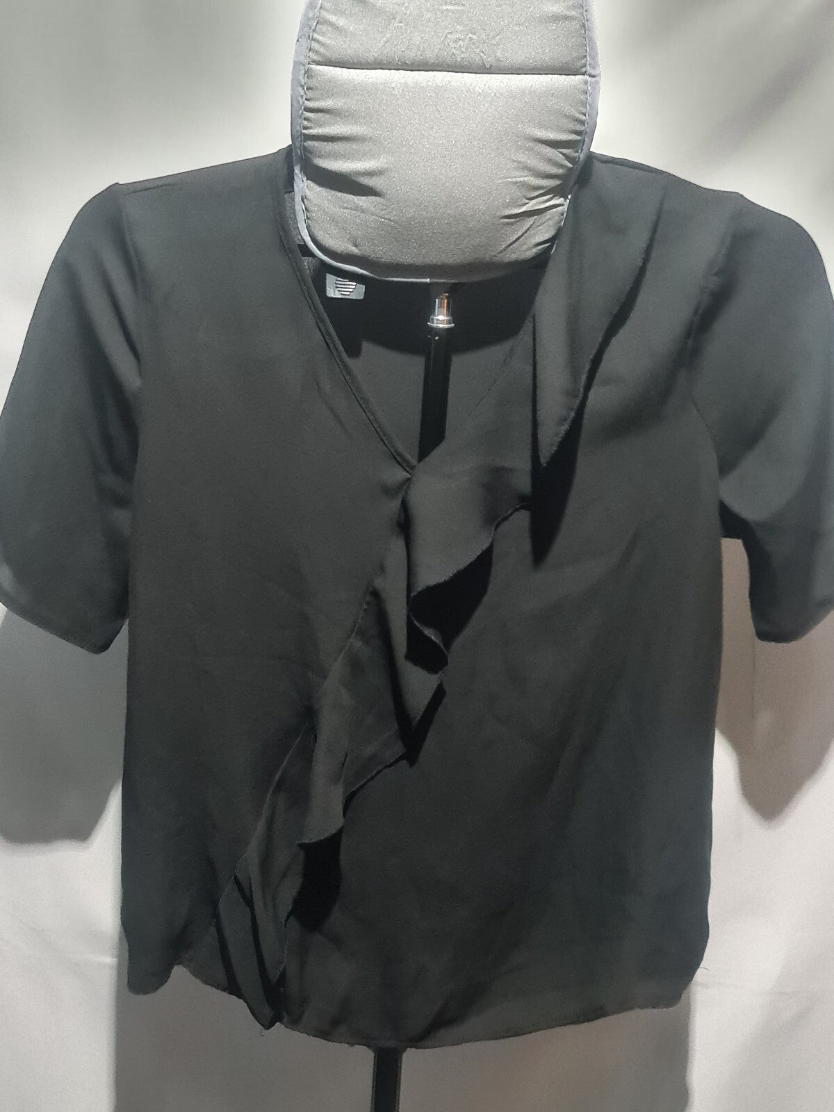 Atmosphere black ruffle front blouse
