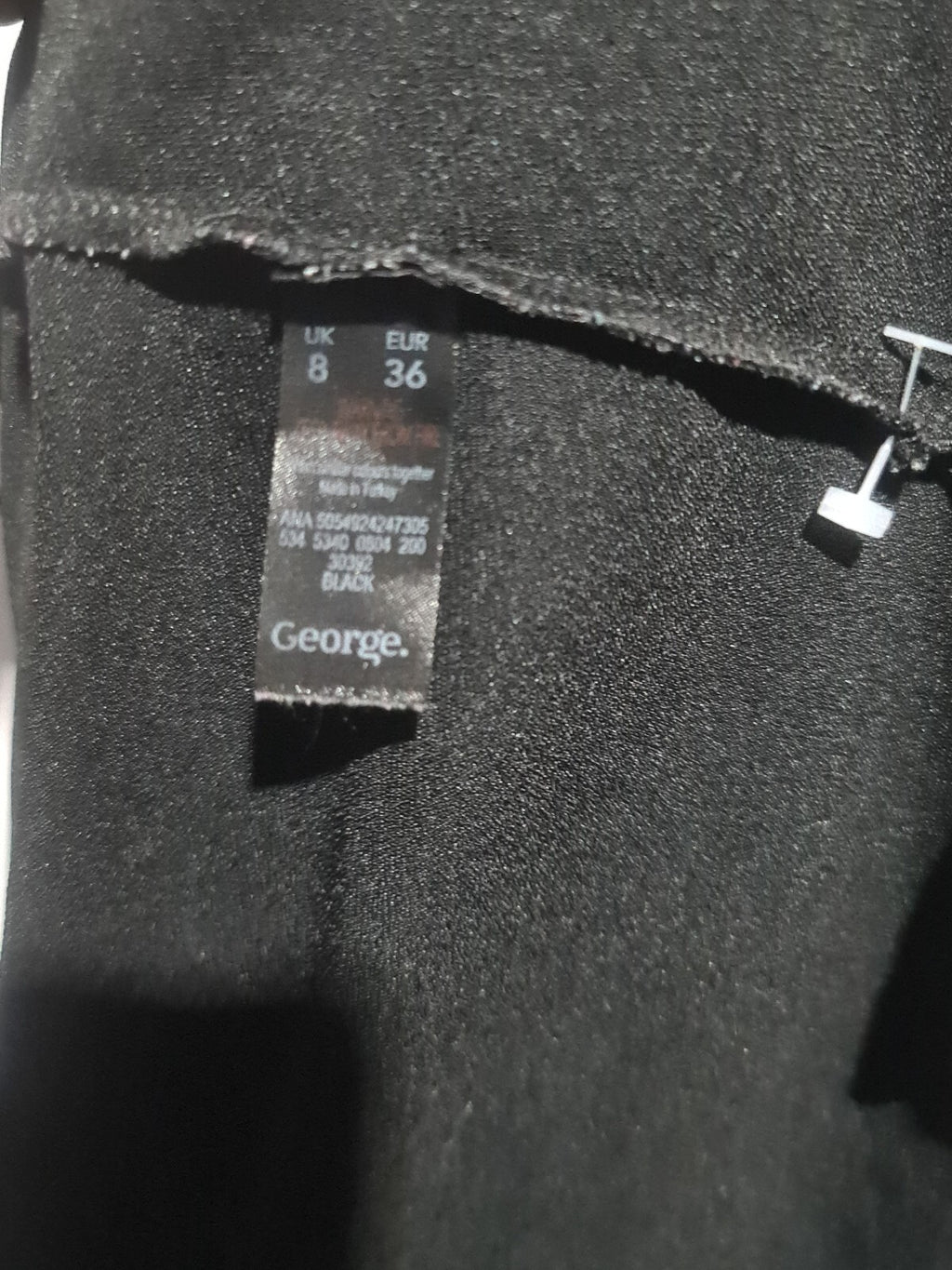 George black sleeveless top with shoulder bows