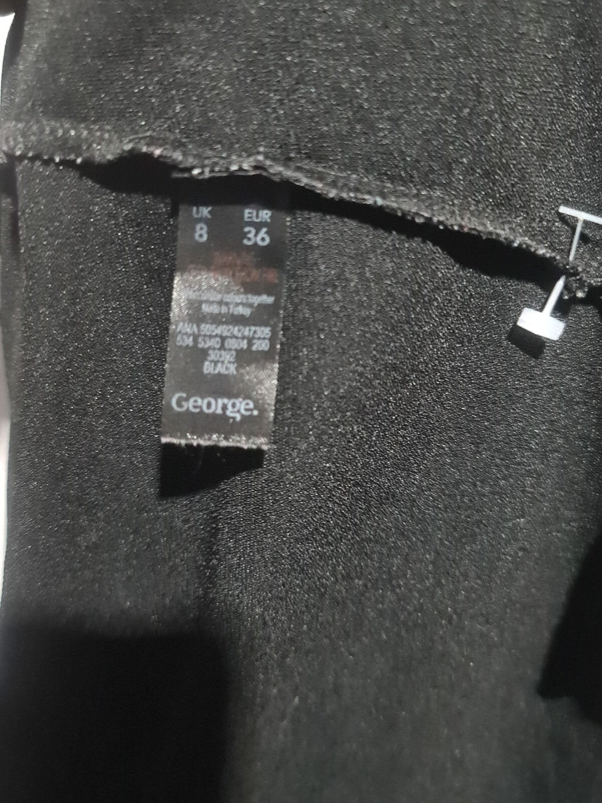 George black sleeveless top with shoulder bows
