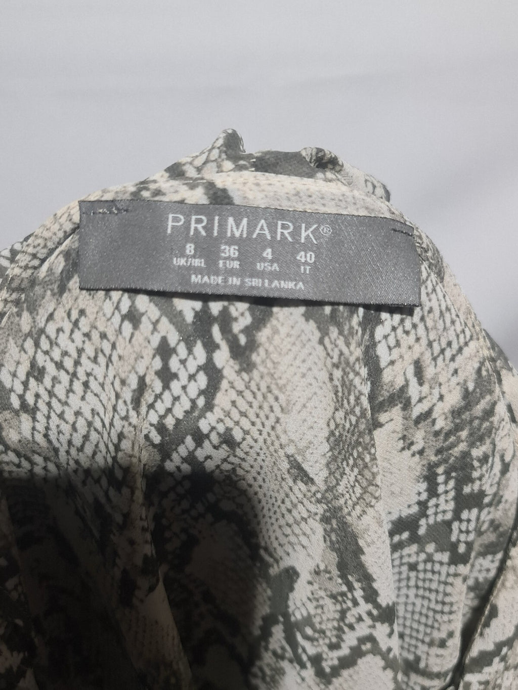 Primark snake print ruffle blouse