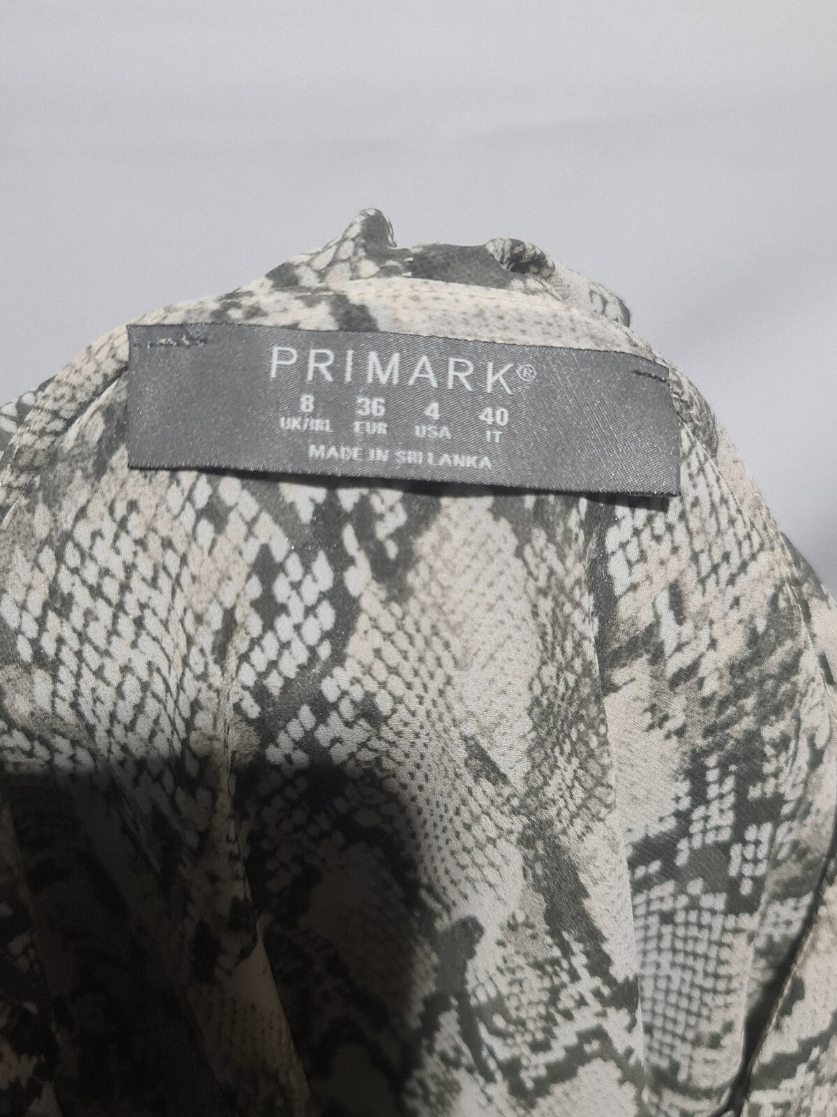 Primark snake print ruffle blouse