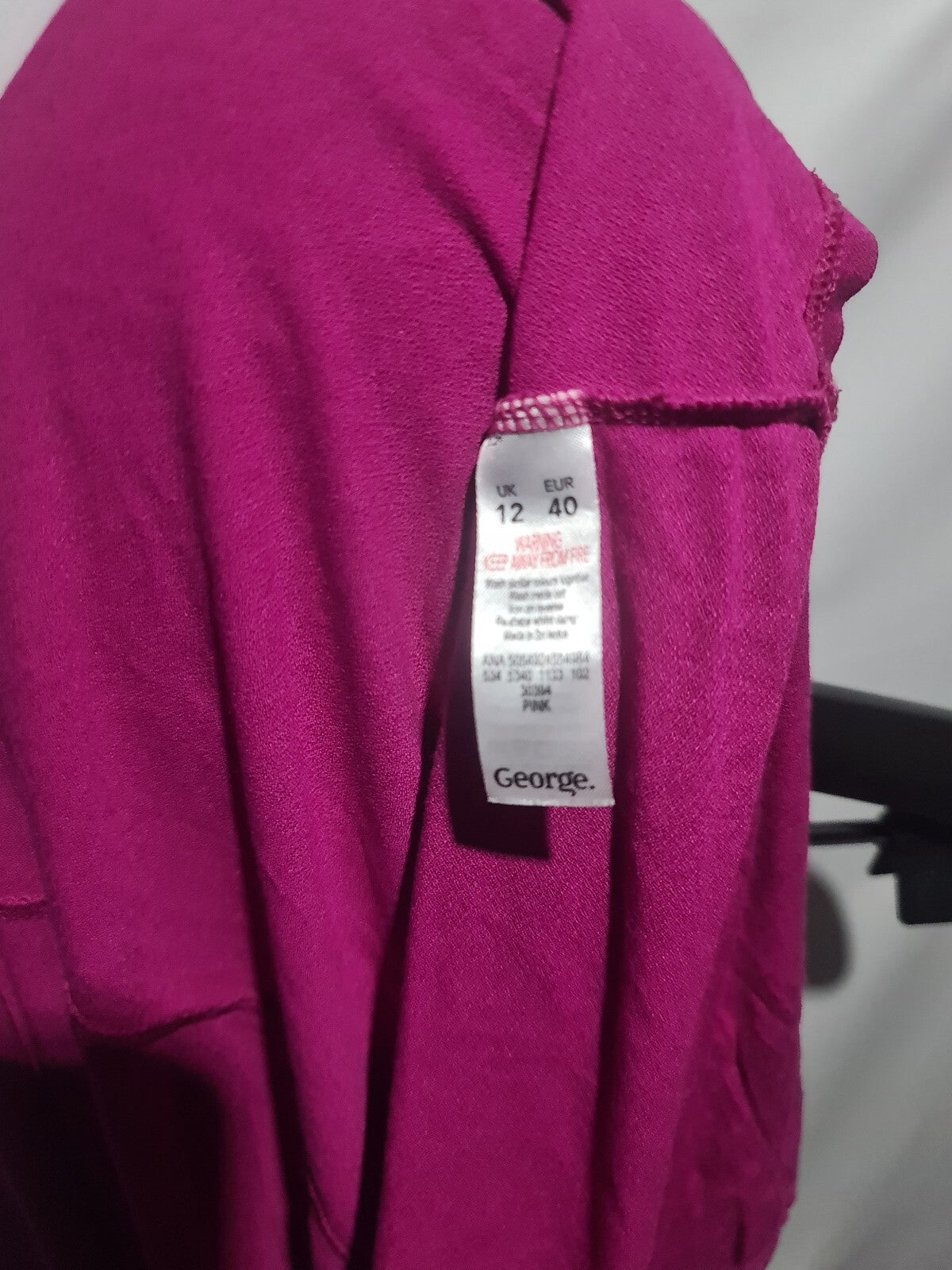 George fuchsia sleeveless button front top