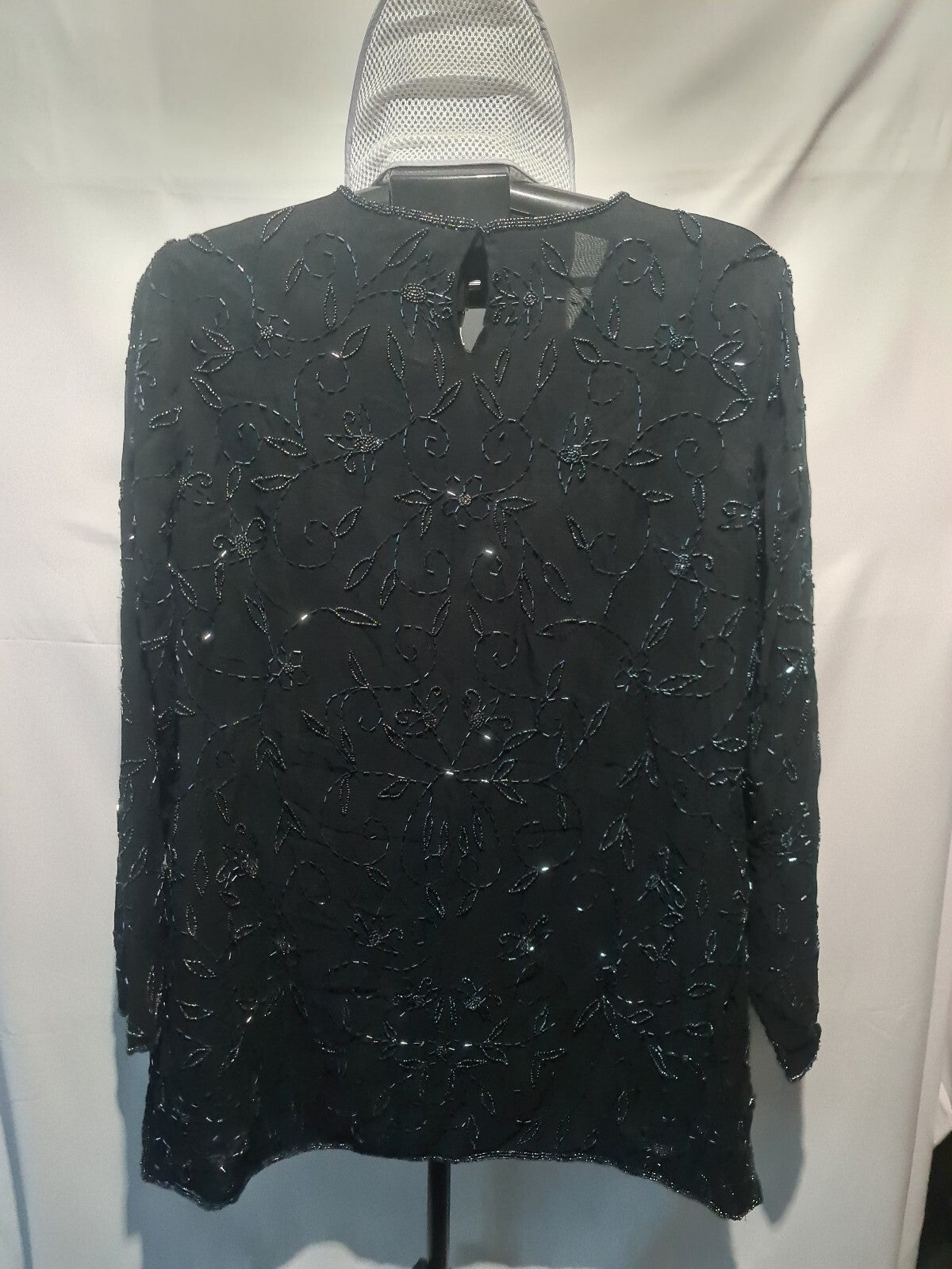 Black embellished V-neck top