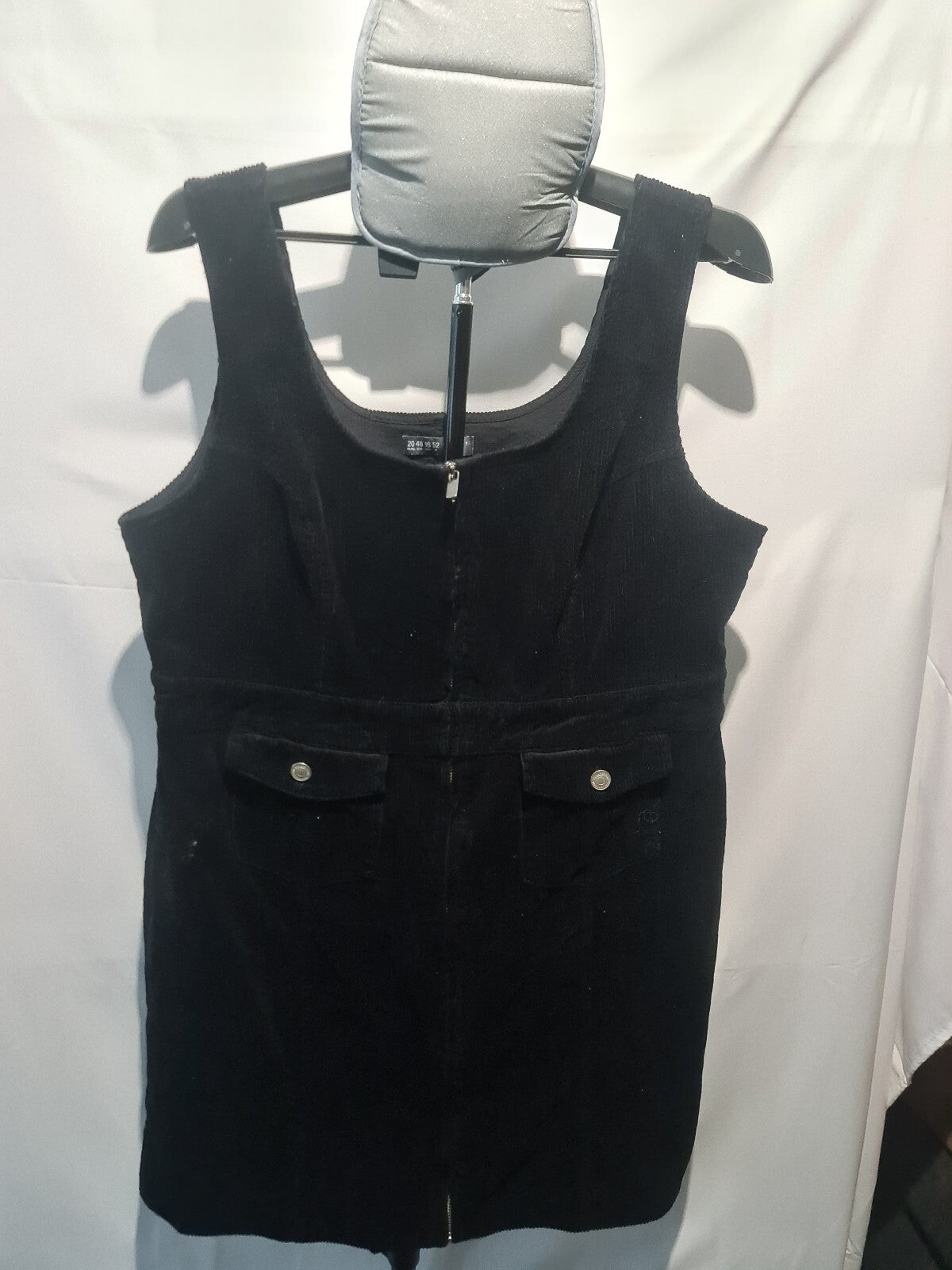 Black sleeveless pinafore dress