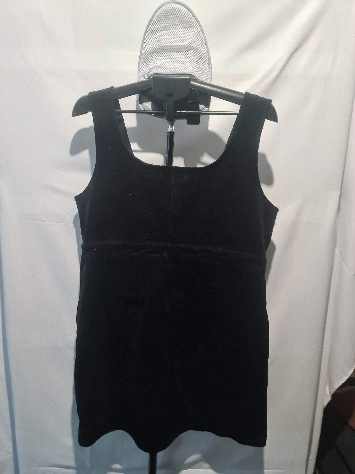 Black sleeveless pinafore dress