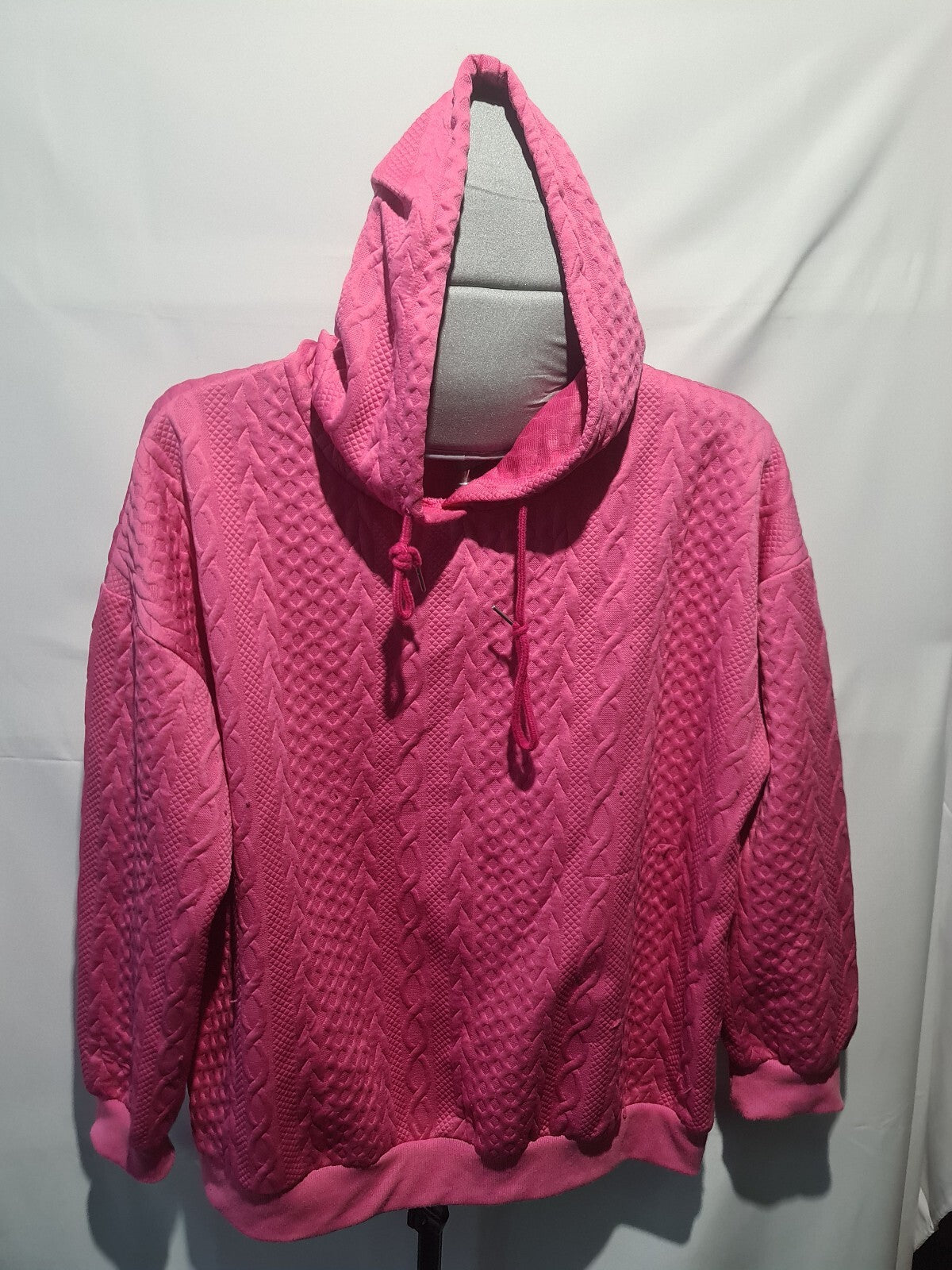 Pink textured hooded sweatshirt