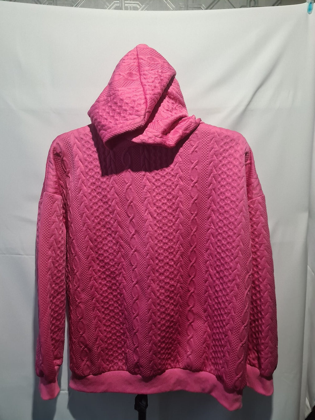 Pink textured hooded sweatshirt