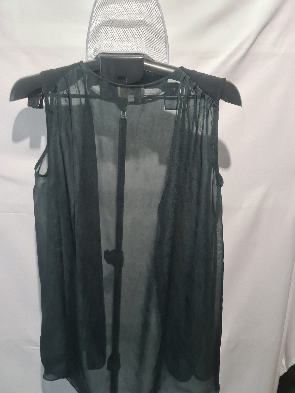 Pixi sheer dark green sleeveless blouse
