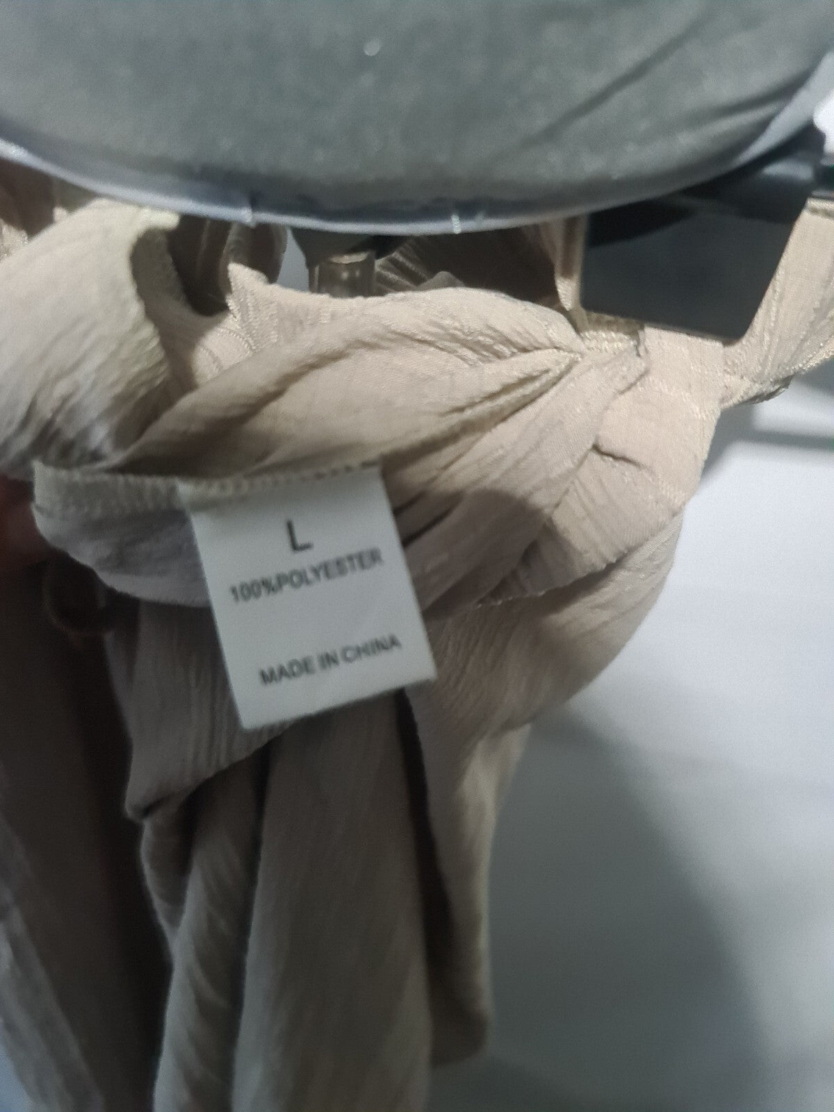Beige crinkle wide leg trousers