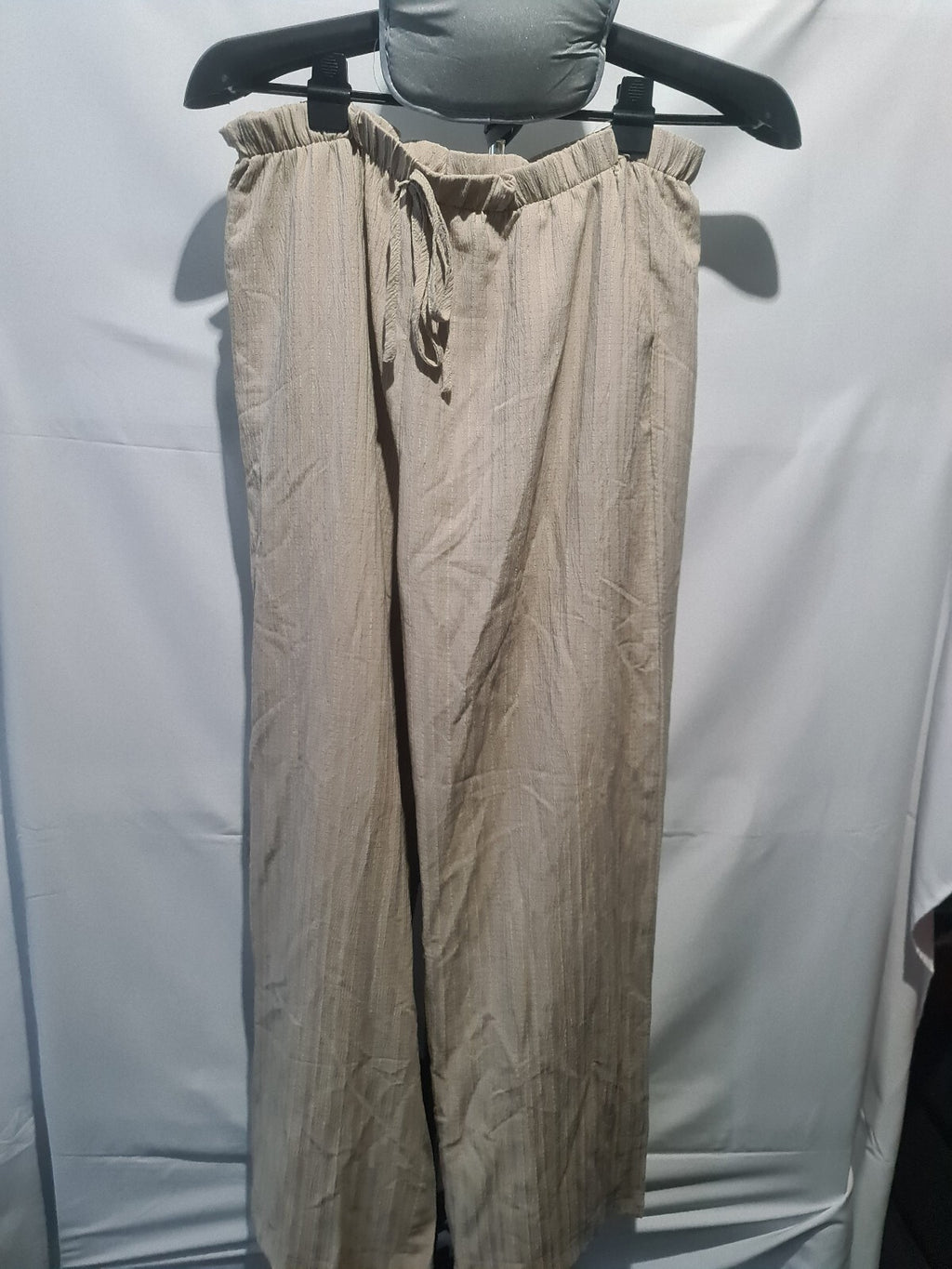 Beige crinkle wide leg trousers