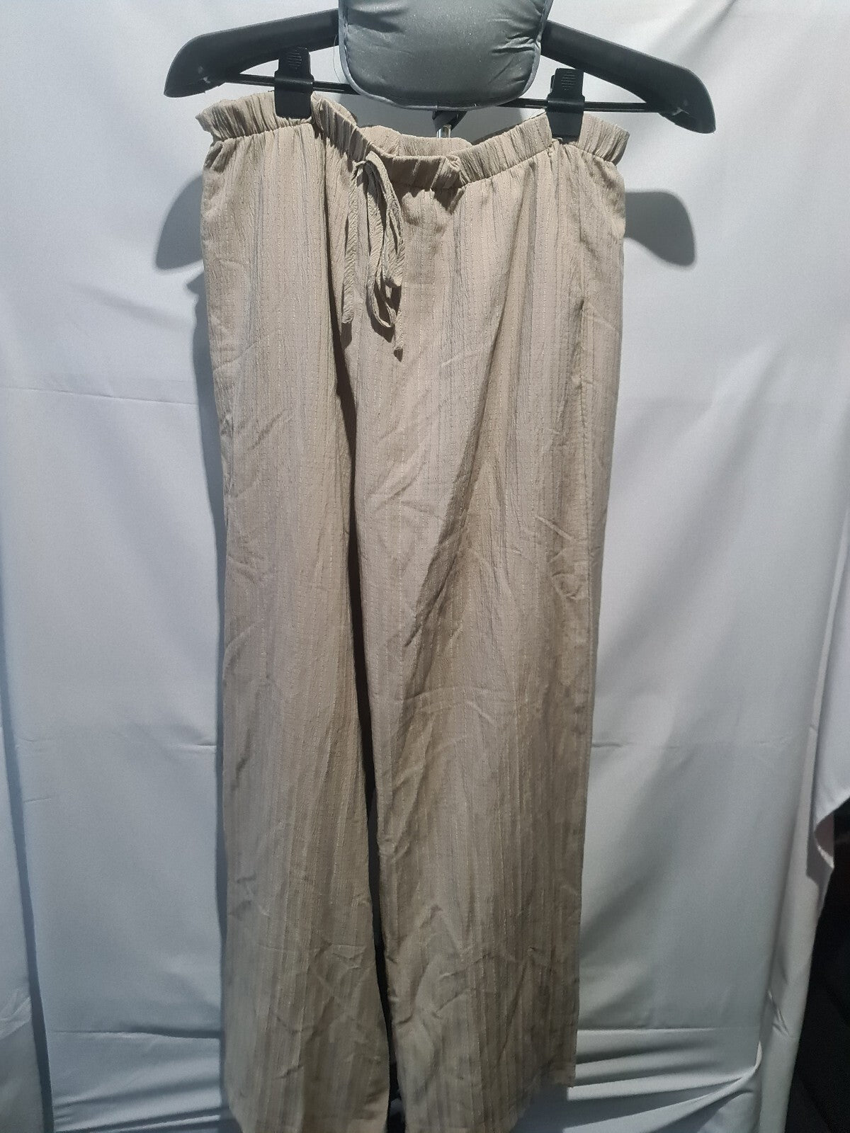 Beige crinkle wide leg trousers