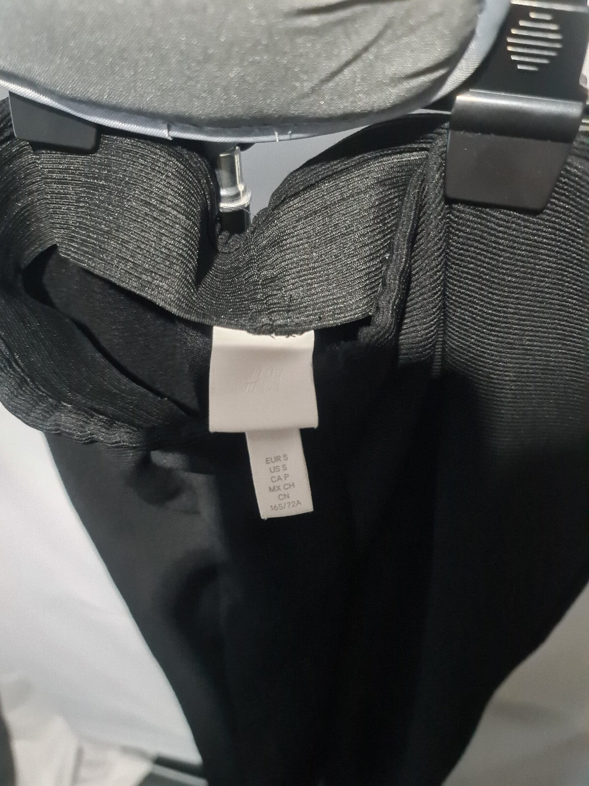 Black tailored trousers