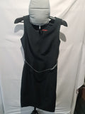 Black sleeveless dress with waist detail
