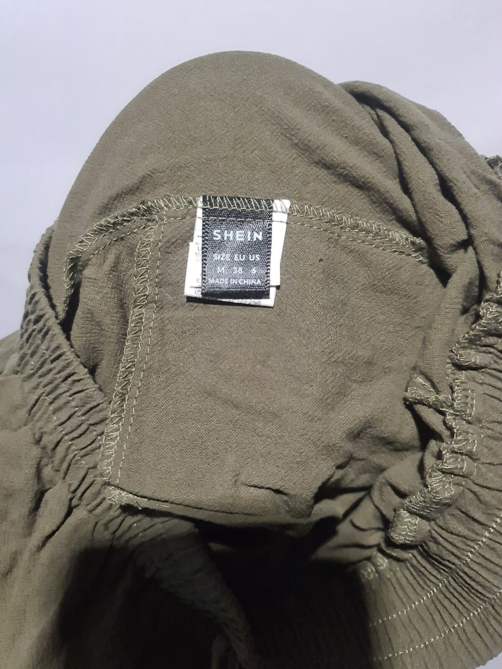 Khaki elastic waist trousers