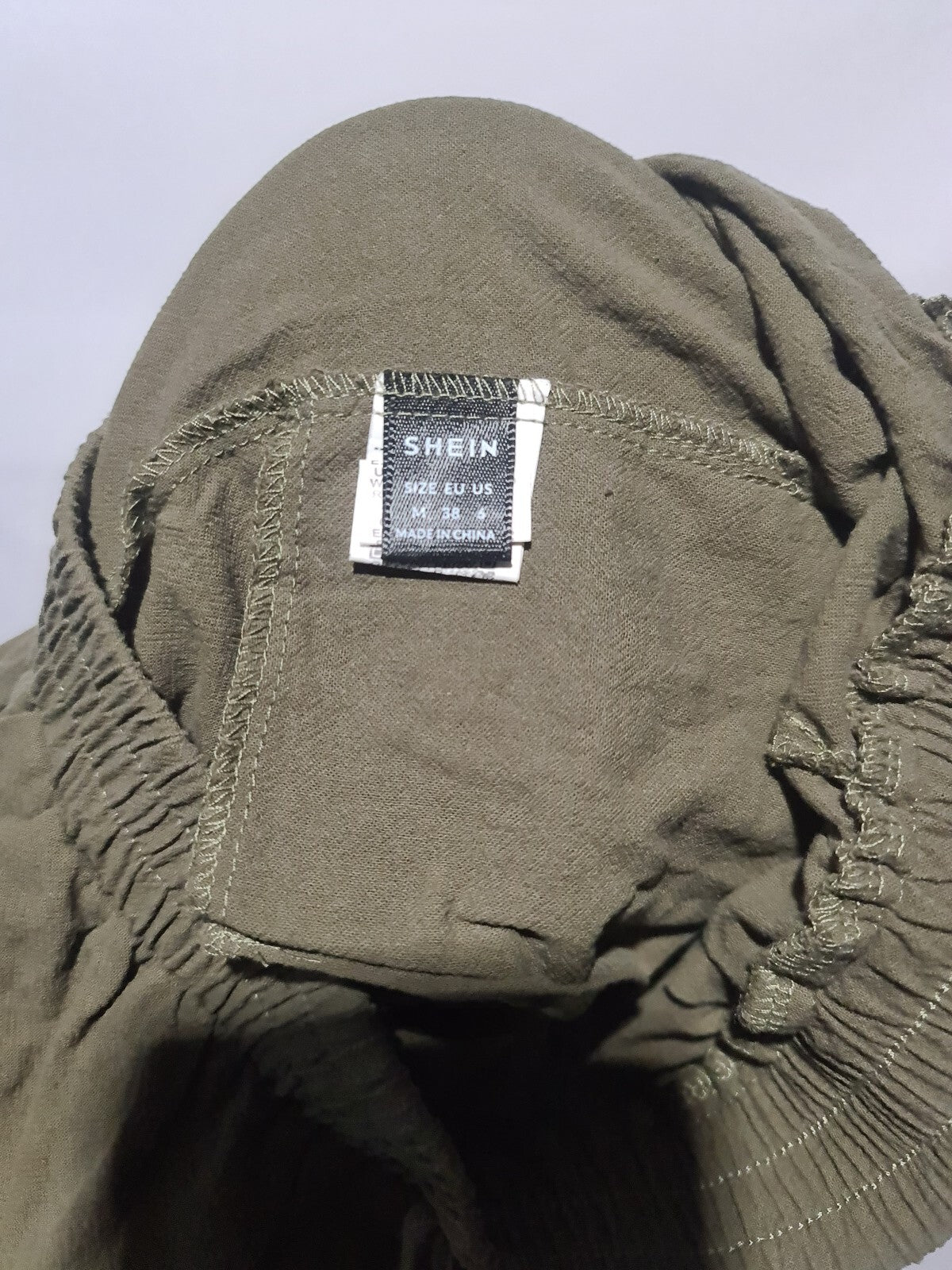Khaki elastic waist trousers